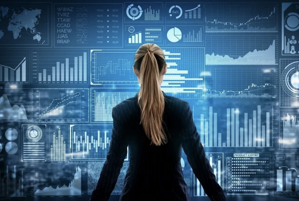 Woman in front of a wall of metric